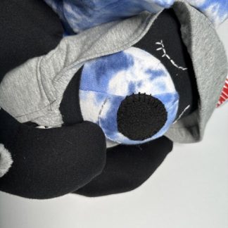 Sleeping angel bear with oval shaped nose