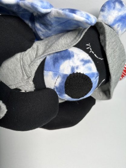 Sleeping angel bear with oval shaped nose