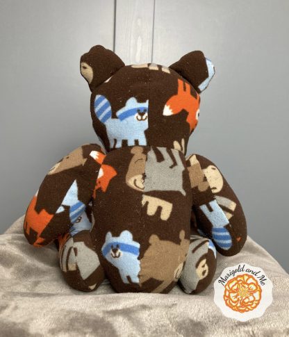 back of bear with oval shaped nose made out of kids pj's